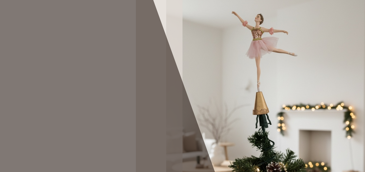 A ballet dancer tree topper stands on top of a decorated Christmas tree in a softly lit living room with a fireplace and garlands in the background.
